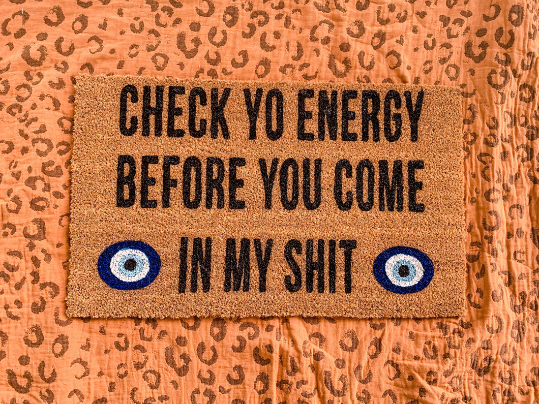 Check yo energy doormat